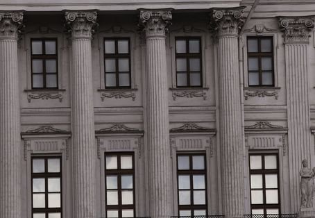 Non-operable picture windows for facade glazing and natural light.