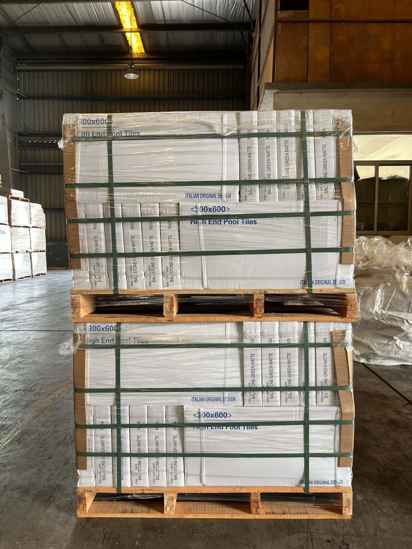 A close-up of secure pallet packaging with corner protection and labeling for a verified export container order.