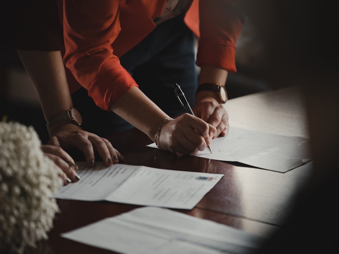 Buyer signing a proforma invoice before releasing a supplier deposit